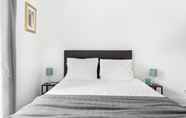 Bedroom 6 ALTIDO Stunning 4BR Apt w/terrace&seaview in Alfama