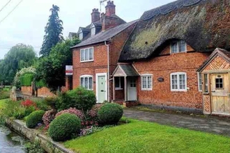 Exterior 4 Village Period Cottage Next to a Idyllic Stream