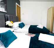 Kamar Tidur 5 Tudors eSuites Four Bedroom House Garden