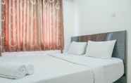 Kamar Tidur 7 Nice and Homey 2BR City Park Apartment