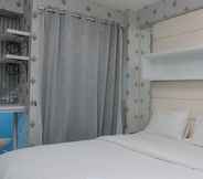 Bedroom 2 Comfort with City View Studio Tifolia Apartment