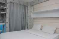 Bedroom Comfort with City View Studio Tifolia Apartment