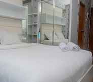 Bedroom 3 Comfort with City View Studio Tifolia Apartment