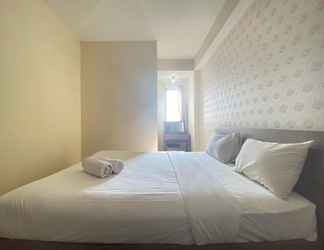 Bedroom 2 Comfy & Pleasant 2BR at Sudirman Suites Apartment