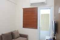 Ruang Umum Comfortable 2BR at Green Pramuka City Apartment Direct Access to Mall