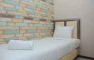 Bedroom 3 Comfortable 2BR at Green Pramuka City Apartment Direct Access to Mall