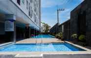 Swimming Pool 2 Trendy and Tidy Studio Room at Puri Mas Apartment