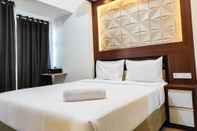 Bedroom Homey and Comfy Studio at Vida View Makasar Apartment