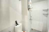 Toilet Kamar Chaste 2BR Apartment at Grand Asia Afrika Residence