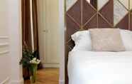 Bedroom 5 Domna Luxury Suites