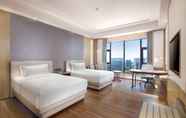 Bedroom 5 Ramada Plaza by Wyndham Dongguan Songshan Lake