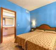 Bilik Tidur 4 Aparthotel Vacances Menorca Blanc Cottage