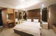 ห้องนอน 5 Cozy The H Residence by Bonzela Property