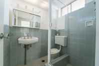 In-room Bathroom Bright and Sunny Studio Apartment