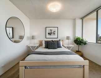 Kamar Tidur 2 Bright and Sunny Studio Apartment