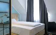 Kamar Tidur 6 Nikii City Hotel