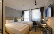 Kamar Tidur 7 Nikii City Hotel