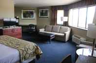 Bedroom APM Inn and Suites