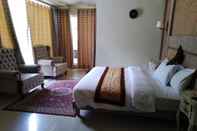 Bedroom Grand Heritage Hotel