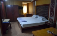 Kamar Tidur 4 National Hotel