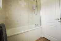 In-room Bathroom 87 Marineside Beach Side Property With Stunning sea Views