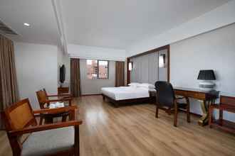 Bilik Tidur 4 Ramada Encore by Wyndham Qionghai Downtown