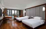 Bedroom 6 Ramada Encore by Wyndham Qionghai Downtown