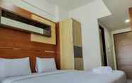 Bedroom 6 Cozy Studio At Vida View Makassar Apartment