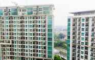 Bangunan 5 Scenic Studio Apartment At Woodland Park Residence