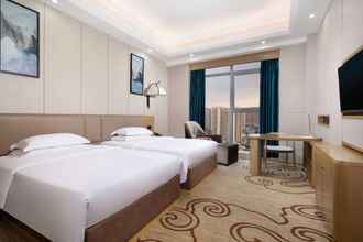 Bedroom 4 Ramada By Wyndham Changsha North