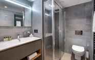 In-room Bathroom 7 Manali Lodge  by Alpine Residences