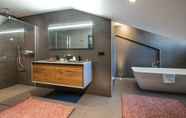 In-room Bathroom 4 Manali Lodge  by Alpine Residences