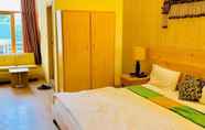 Bedroom 6 Green Village Resorts