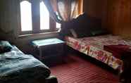 Kamar Tidur 4 Elysium Inn Guest House