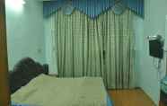 Kamar Tidur 3 Goroomgo Hotel Manglam Kanpur