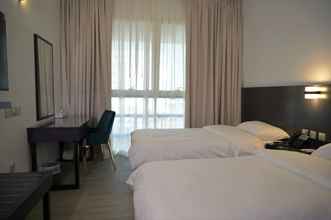 Kamar Tidur 4 Garden City Hotel