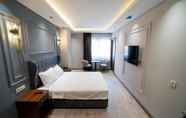 Kamar Tidur 6 Comfort Suites Hotel