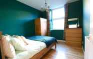 Kamar Tidur 7 Comfortable Apartment in West End