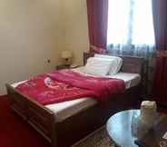 Bilik Tidur 5 Ghizer Blossom Inn Hotel