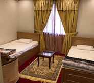Kamar Tidur 4 Ghizer Blossom Inn Hotel