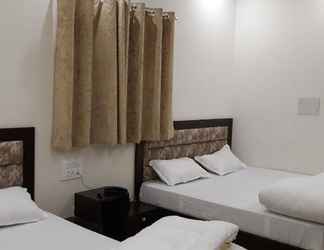 Bedroom 2 Goroomgo Hotel Gokul Grand Dehradun
