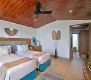 Bedroom 7 Anantara World Islands Dubai Resort