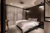 Bedroom Ilsan Queen Town Hotel