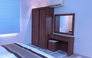 Kamar Tidur 7 Ghoroub Al Shams Furnished Apartments