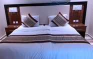 Kamar Tidur 4 Ghoroub Al Shams Furnished Apartments