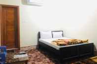 Bedroom Muree Continental Hotel