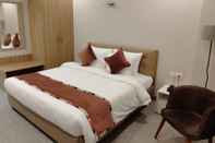 Bedroom ROSASTAYS Gurugram Sec 31