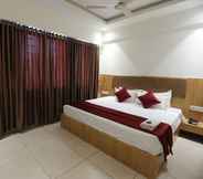 Bedroom 2 HOTEL SHAGUN ROOMS & BANQUET Surat