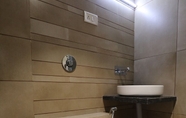 In-room Bathroom 5 HOTEL SHAGUN ROOMS & BANQUET Surat