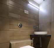 In-room Bathroom 5 HOTEL SHAGUN ROOMS & BANQUET Surat